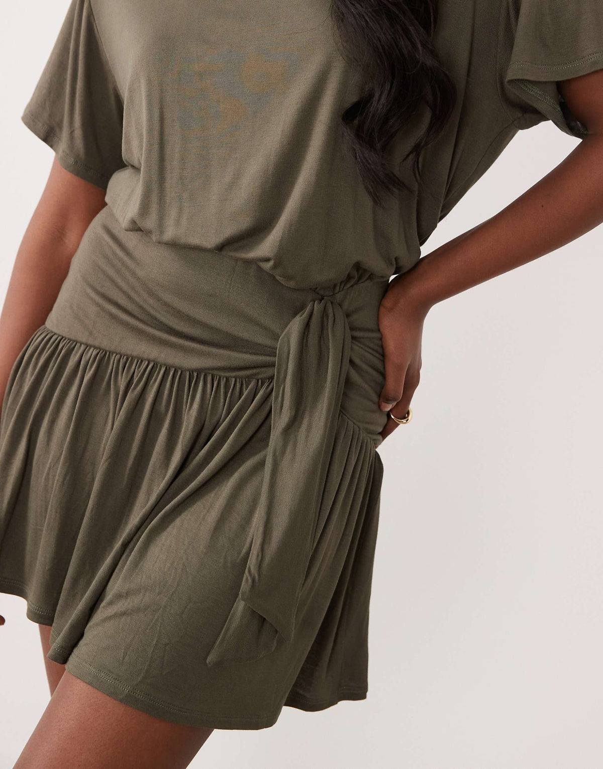 ASOS DESIGN peplum hem mini dress with tied knot detail in khaki green