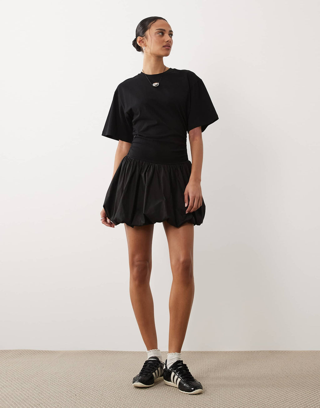 ASOS DESIGN cinched waist bubble hem mini dress in black