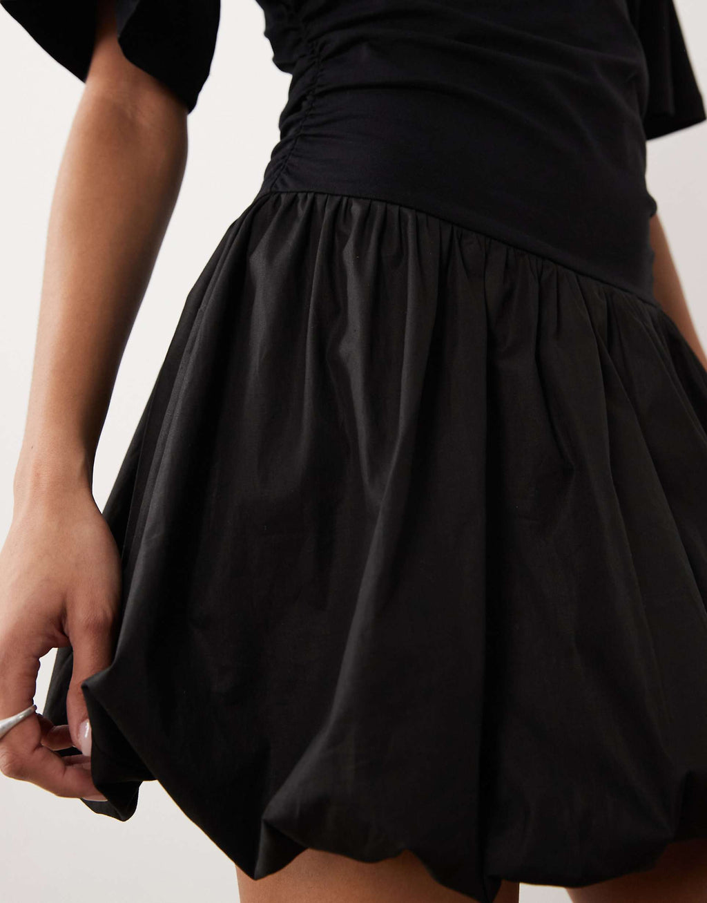 ASOS DESIGN cinched waist bubble hem mini dress in black
