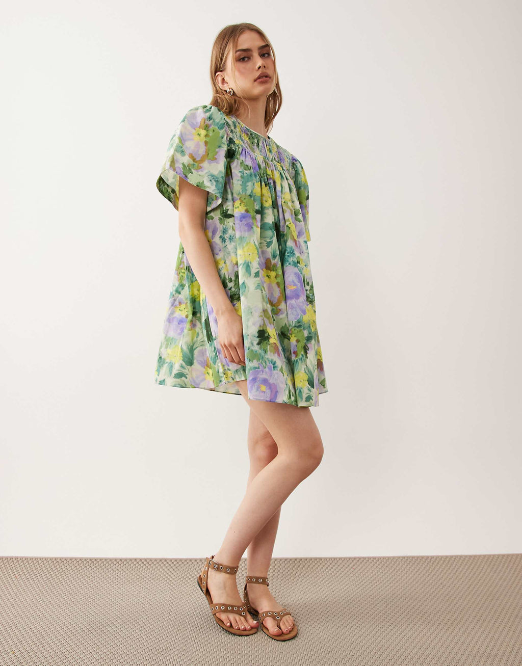 ASOS DESIGN crew neck shirred smock mini dress in green floral print