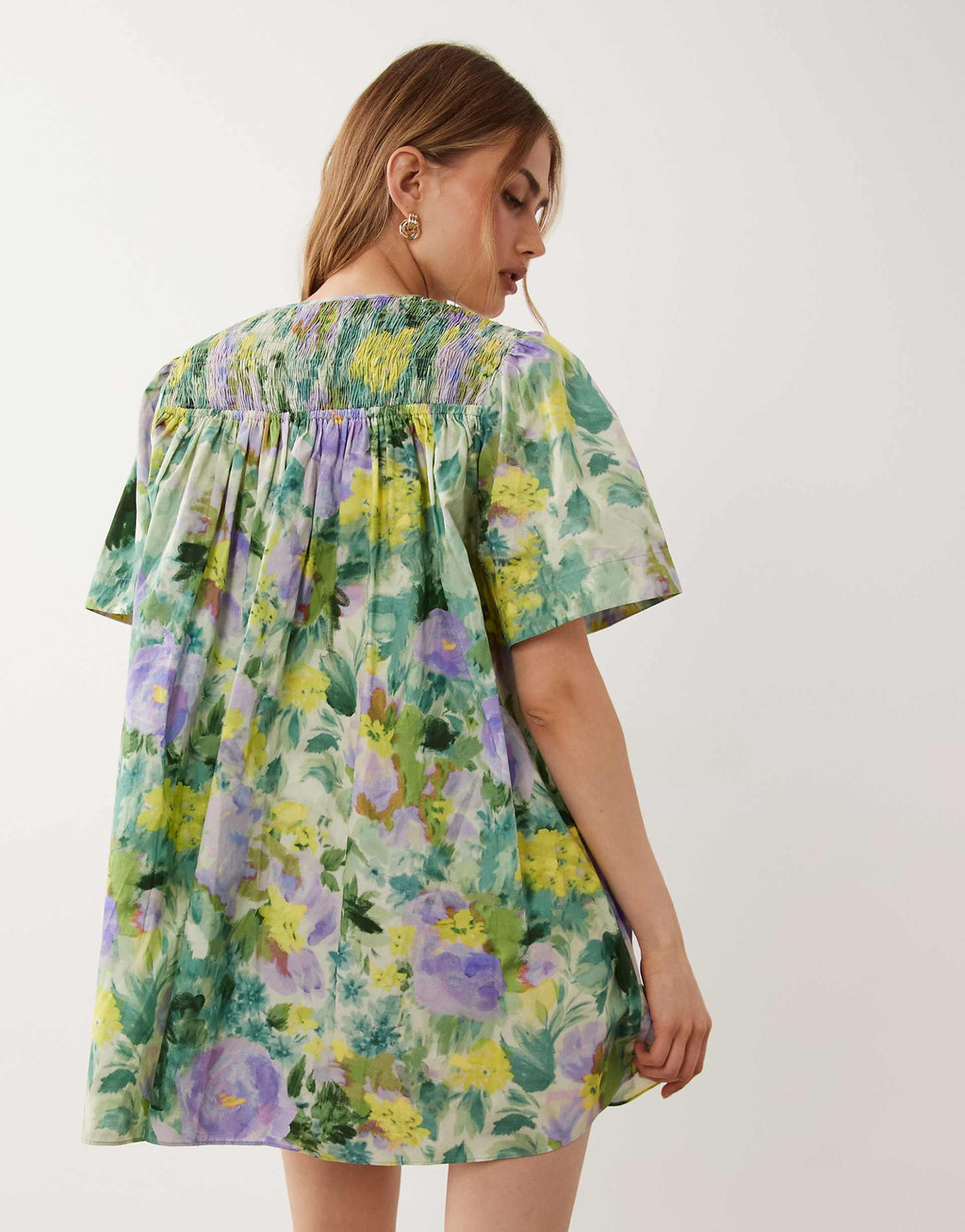 ASOS DESIGN crew neck shirred smock mini dress in green floral print