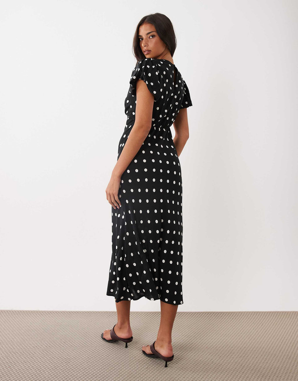 Nobody's Child Sicily puff sleeve bias cut midi dress in black polka dots