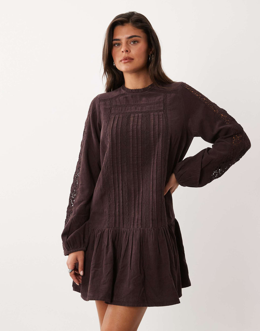 Nobody's Child Denise pointelle high neck paneled peplum hem mini dress in brown