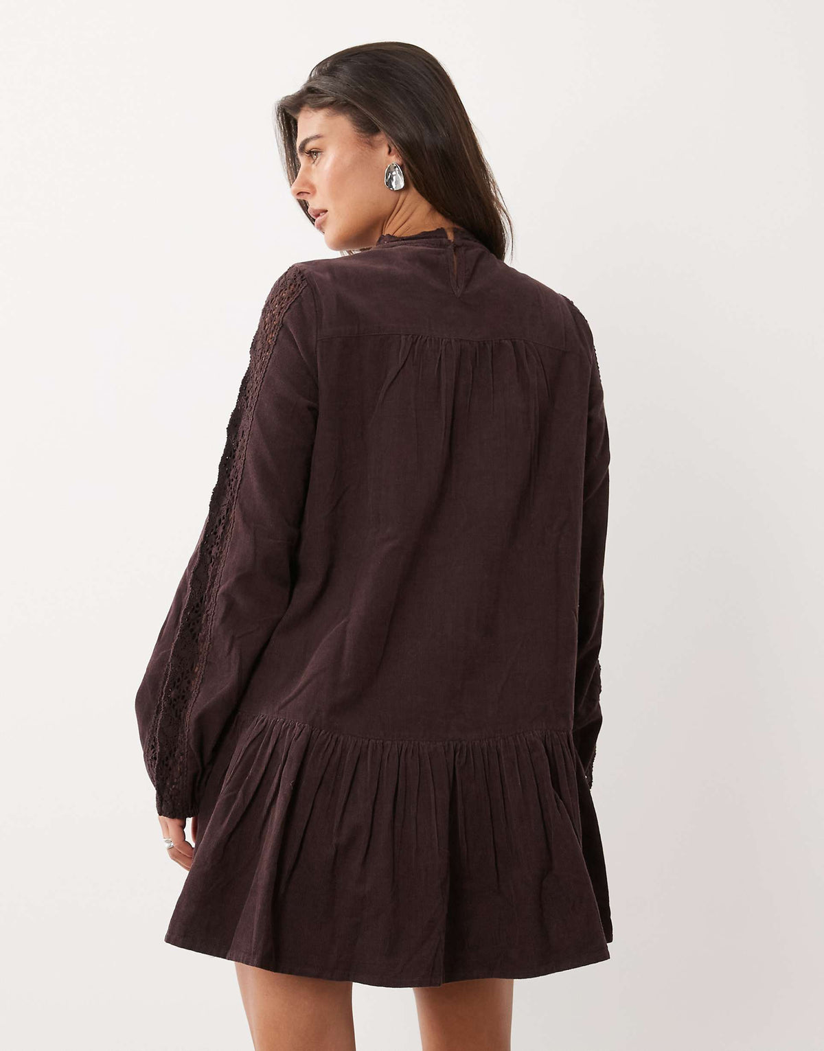 Nobody's Child Denise pointelle high neck paneled peplum hem mini dress in brown