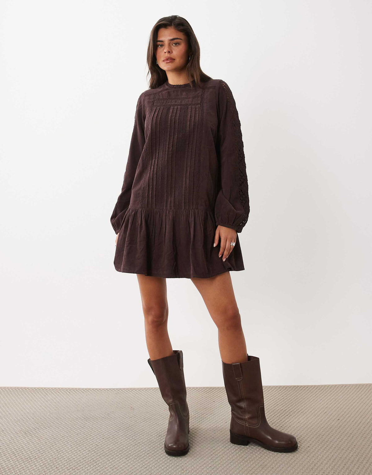 Nobody's Child Denise pointelle high neck paneled peplum hem mini dress in brown