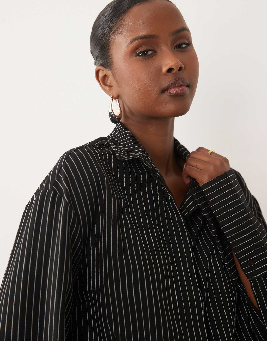 Noughts & Kisses cotton rich button up asymmetric hem deep cuff mini shirt dress in black pinstripe