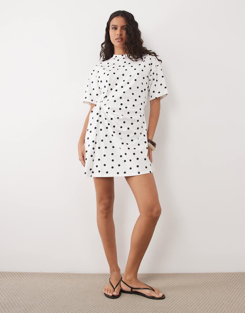 ASOS DESIGN wrapped waist mini dress in mono polka dot