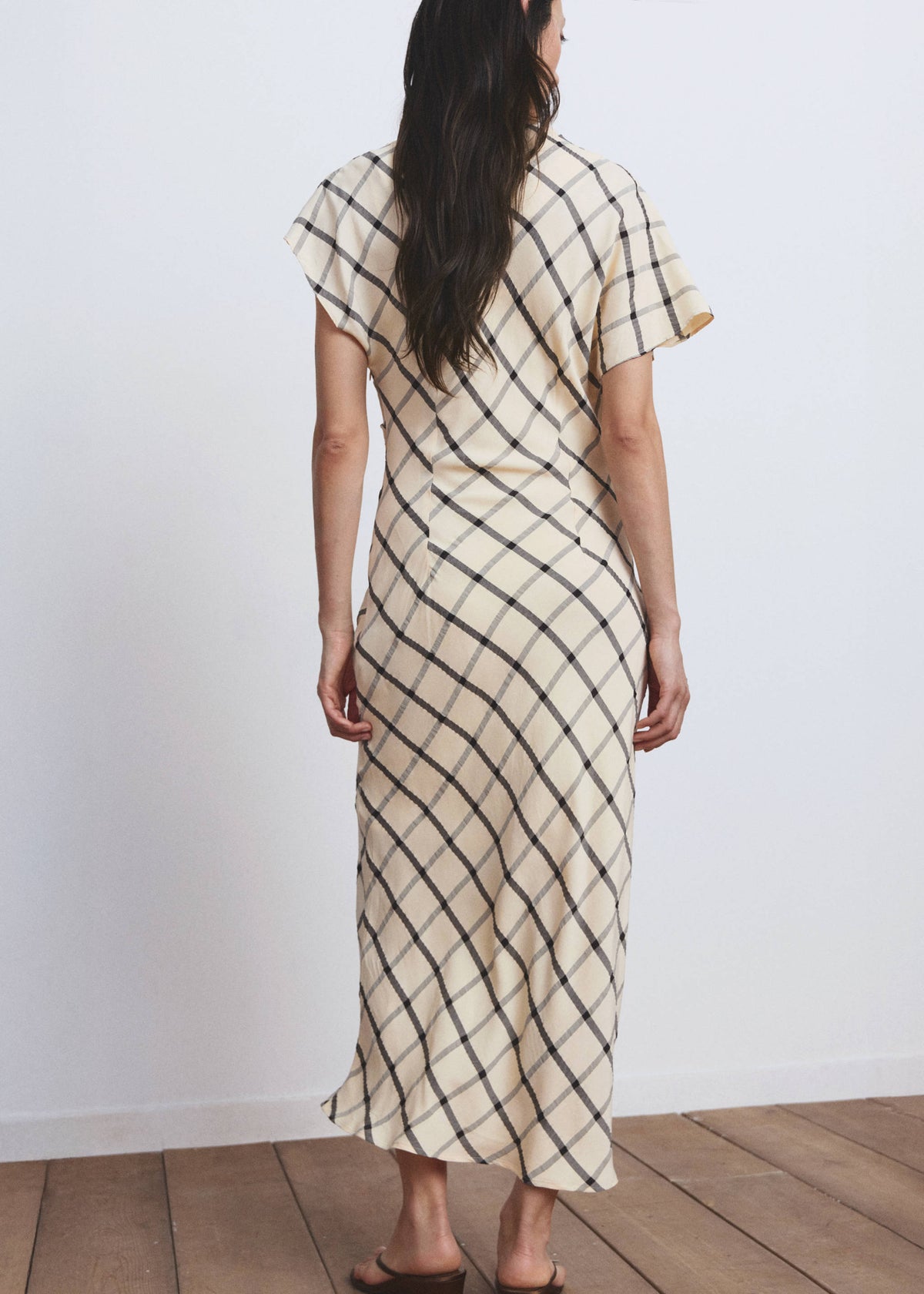 Checked dress with draped neckline