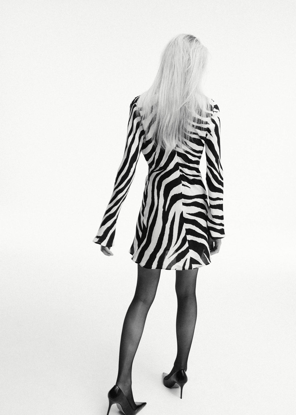 Zebra-print dress with flared sleeves