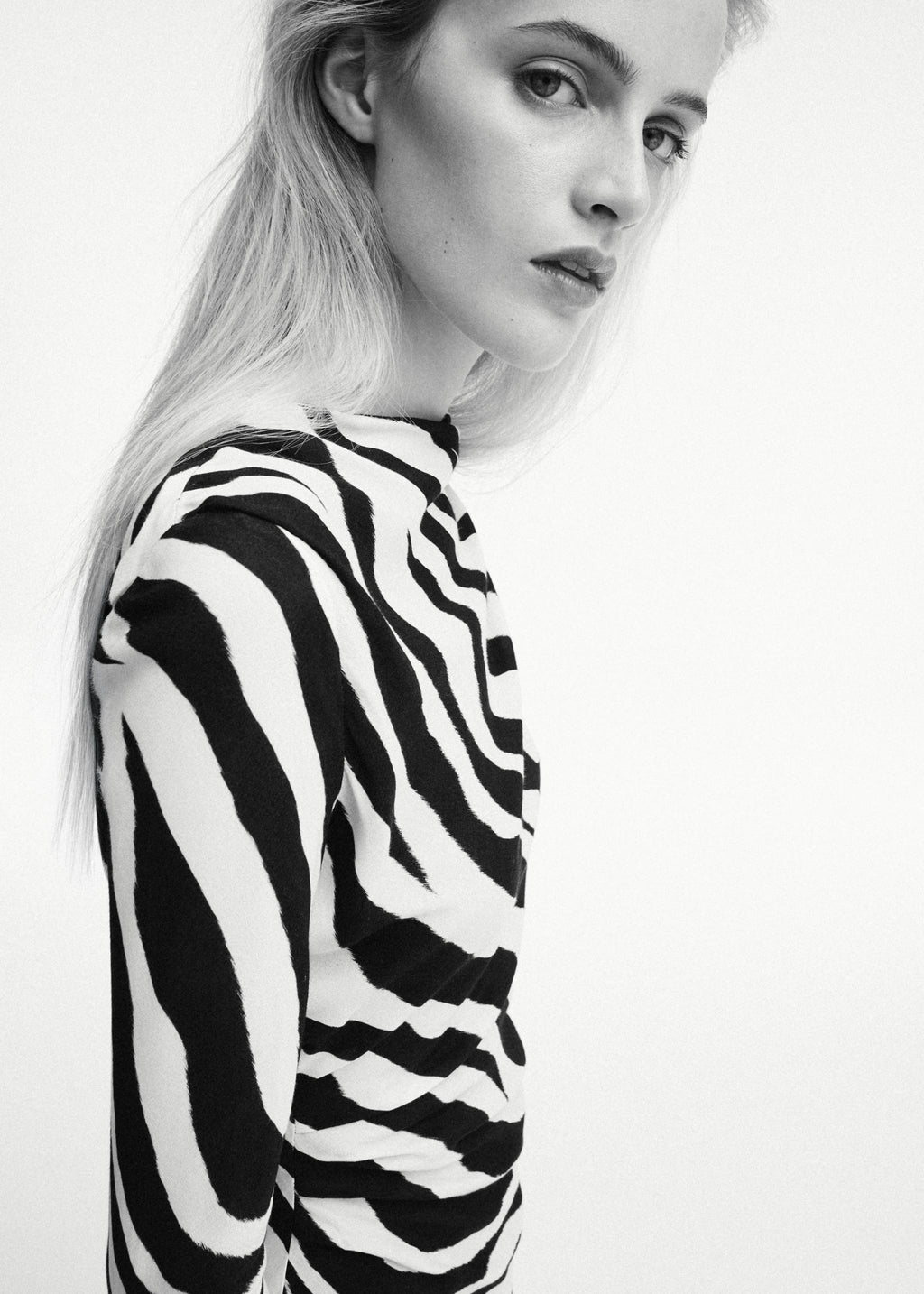 Zebra-print dress with flared sleeves