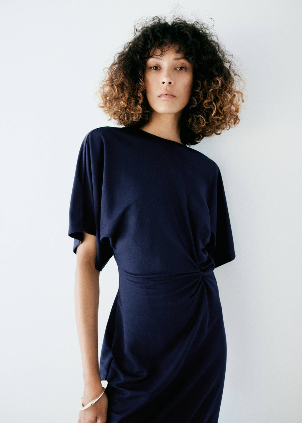 Knit dress with knot detail