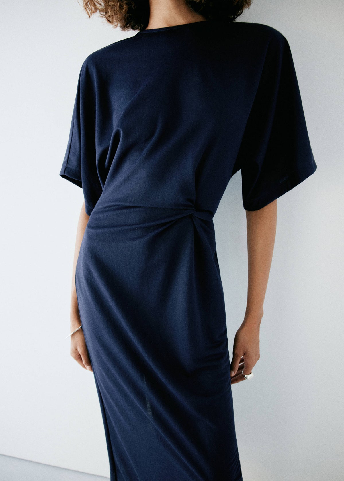 Knit dress with knot detail